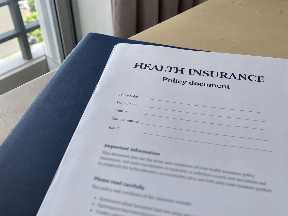 Health insurance policy paperwork (AI-generated illustration)