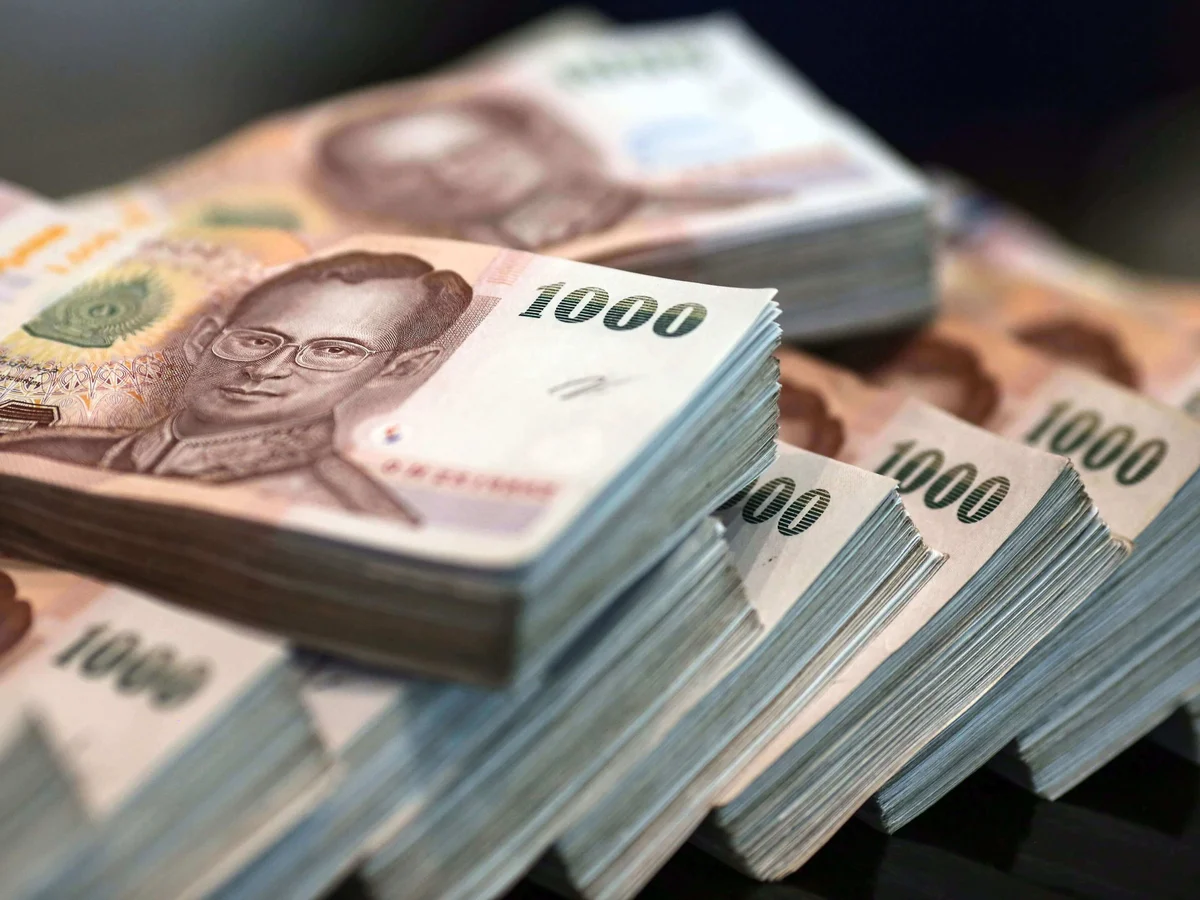 Bundles of Thai baht banknotes