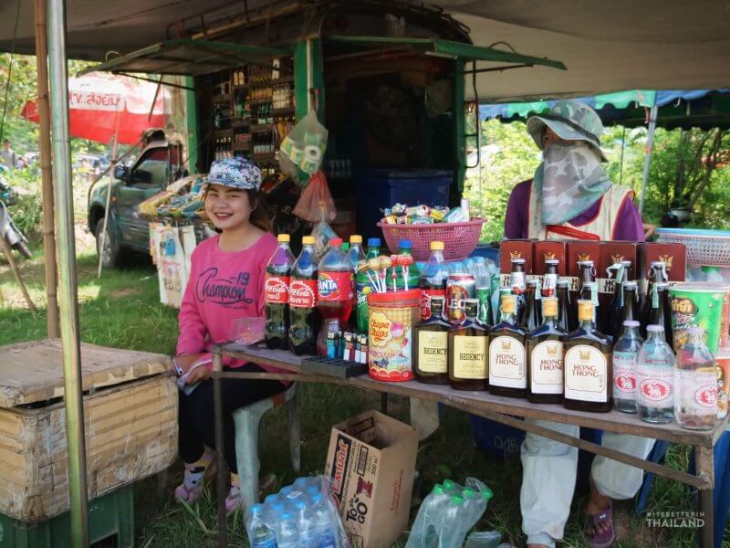 selling whiskey at Yasothon Bun Bang Fai Rocket Festival