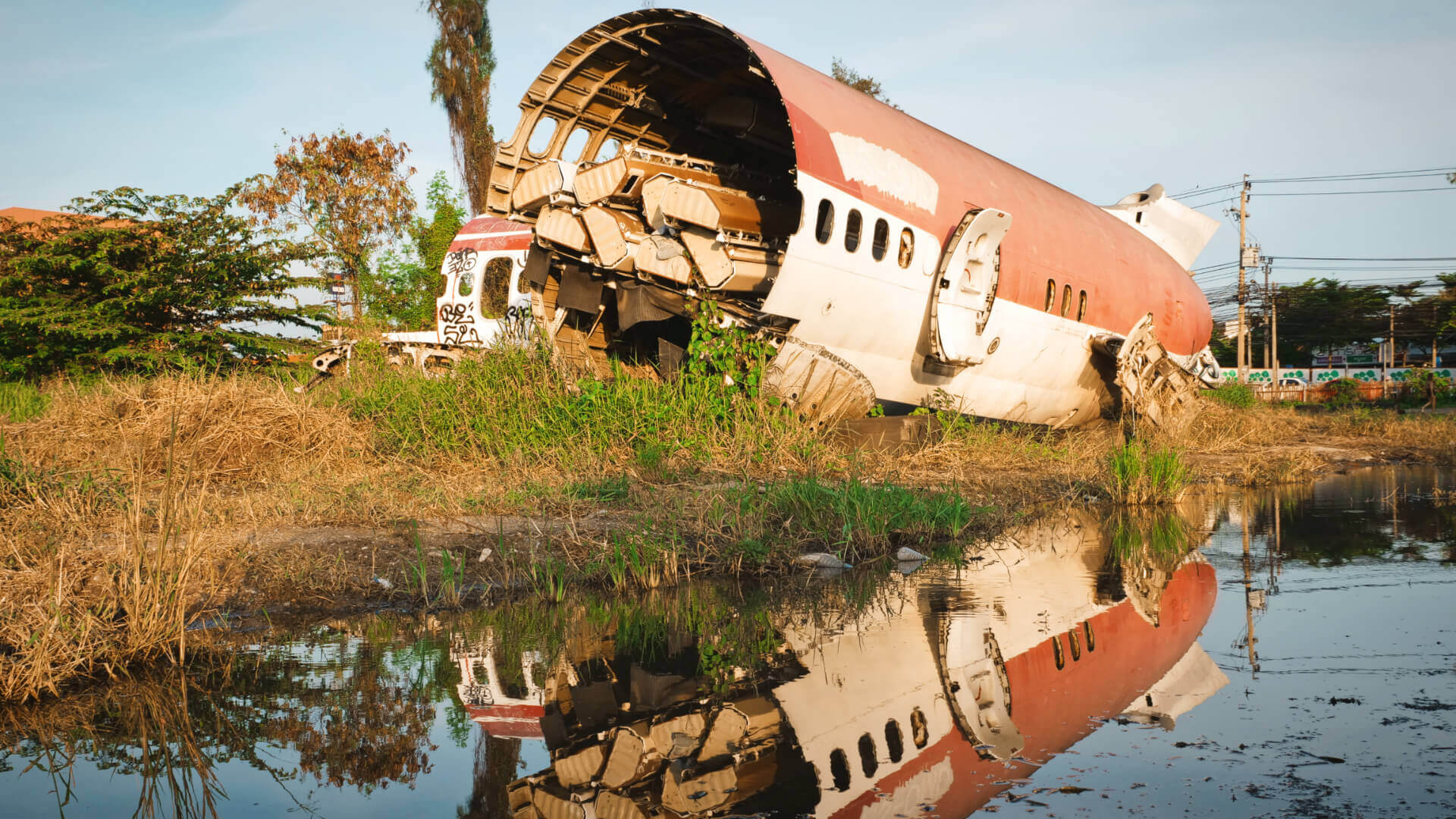 Plane junkyard reflection