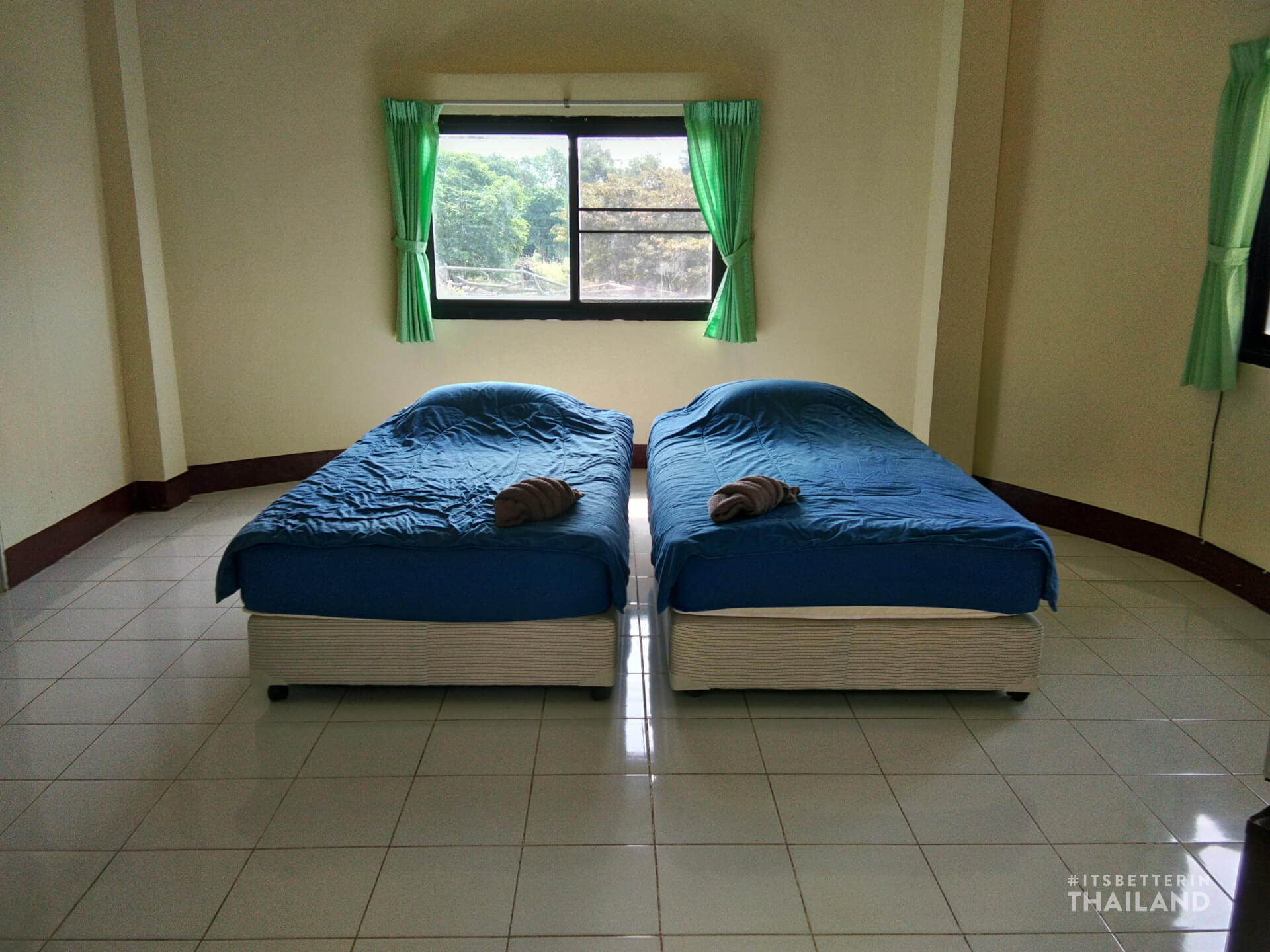 beds inside Khon Kaen zoo bungalows