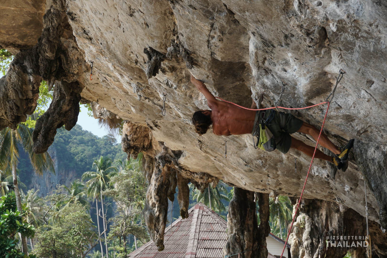 Rock climbing on Tonsai roof in Thailand